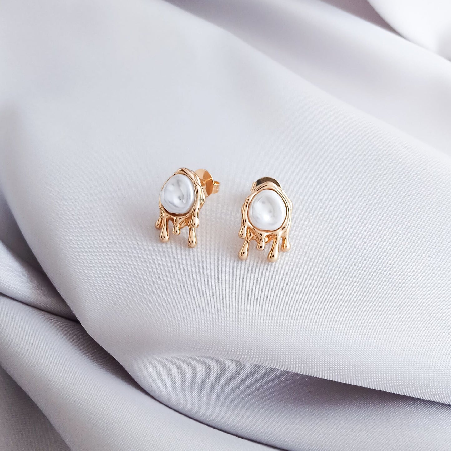 Pendientes de perla fundida