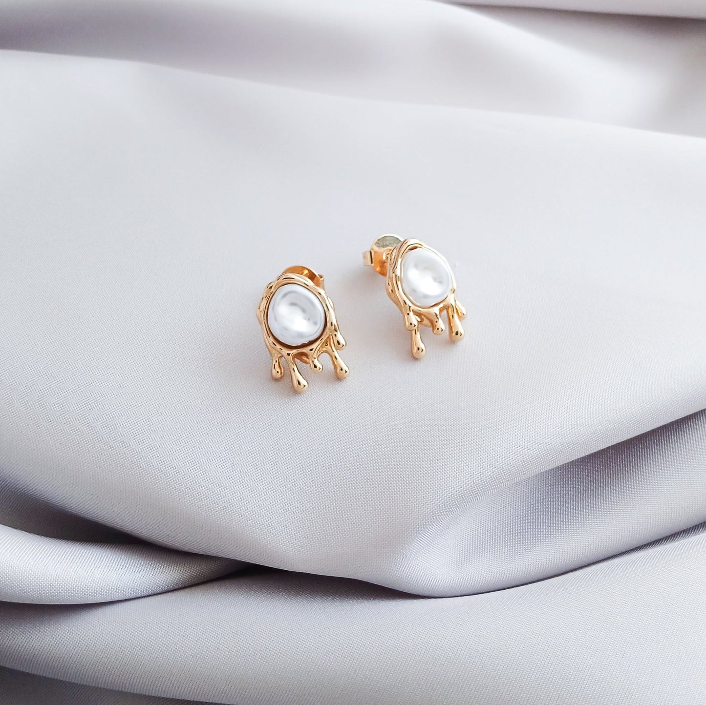 Pendientes de perla fundida