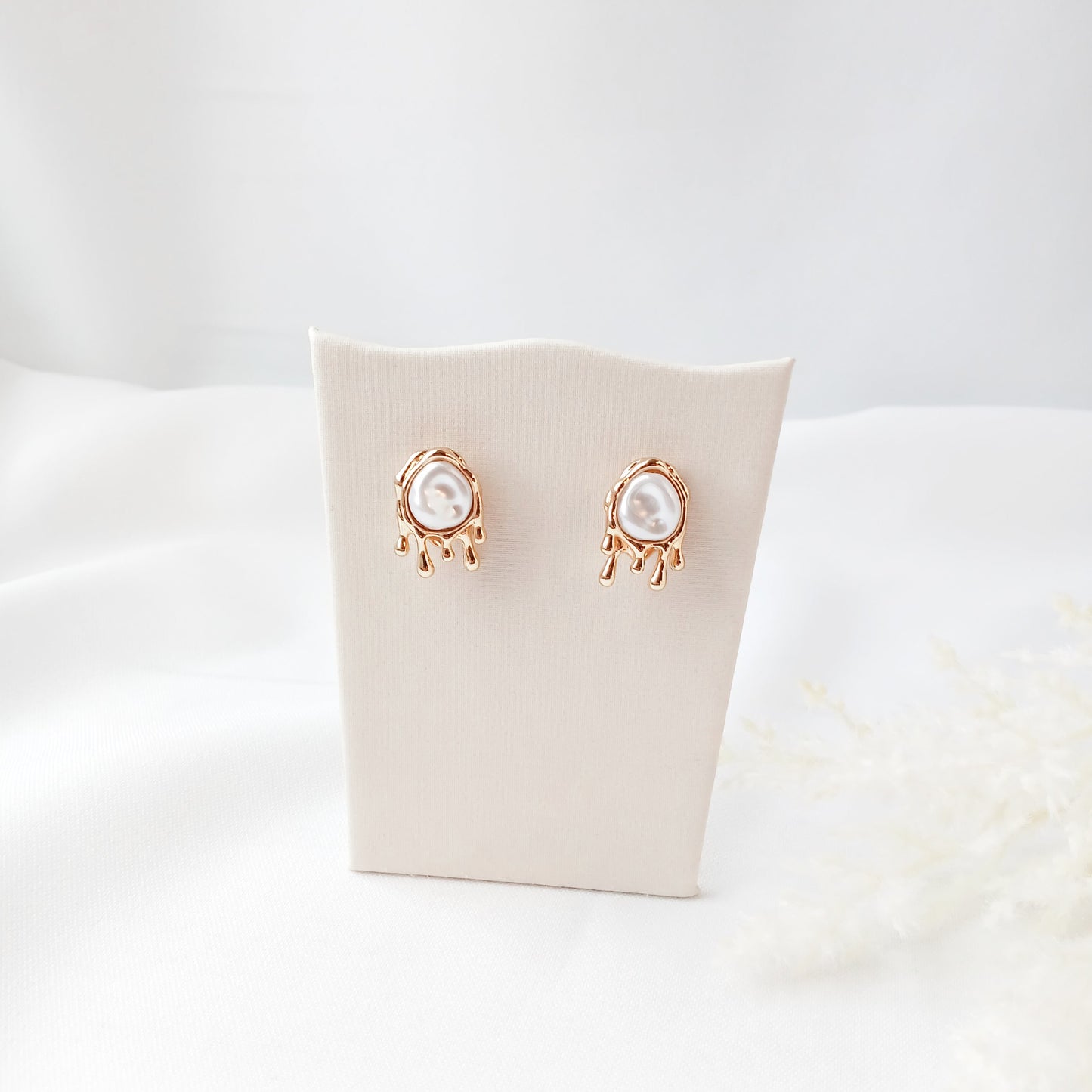 Pendientes de perla fundida